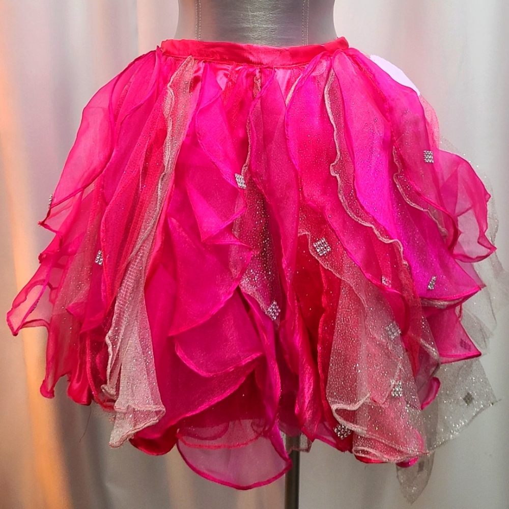 Celb.designer Maggie Barry custom ruffled sequins tutu with safe pin details.